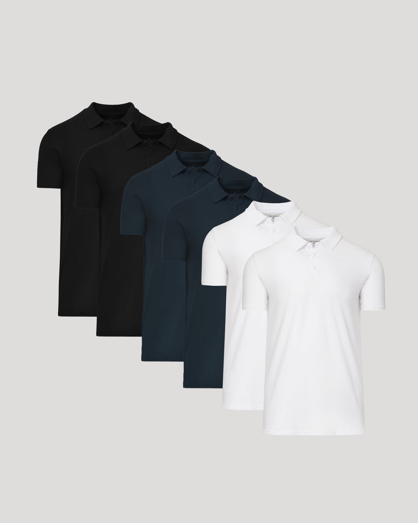 The Timeless Tall Classic Polo 6-Pack, showcasing six neatly arranged polos.
