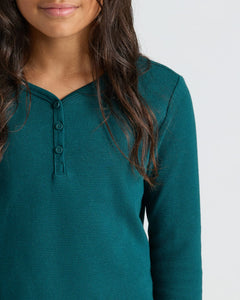 True ClassicGirls Deep Emerald Waffle Henley on model, showcasing textured, cozy fabric.