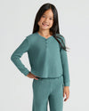 Girl wearing Girls Stormcloud Long Sleeve Boxy Waffle Henley, smiling.