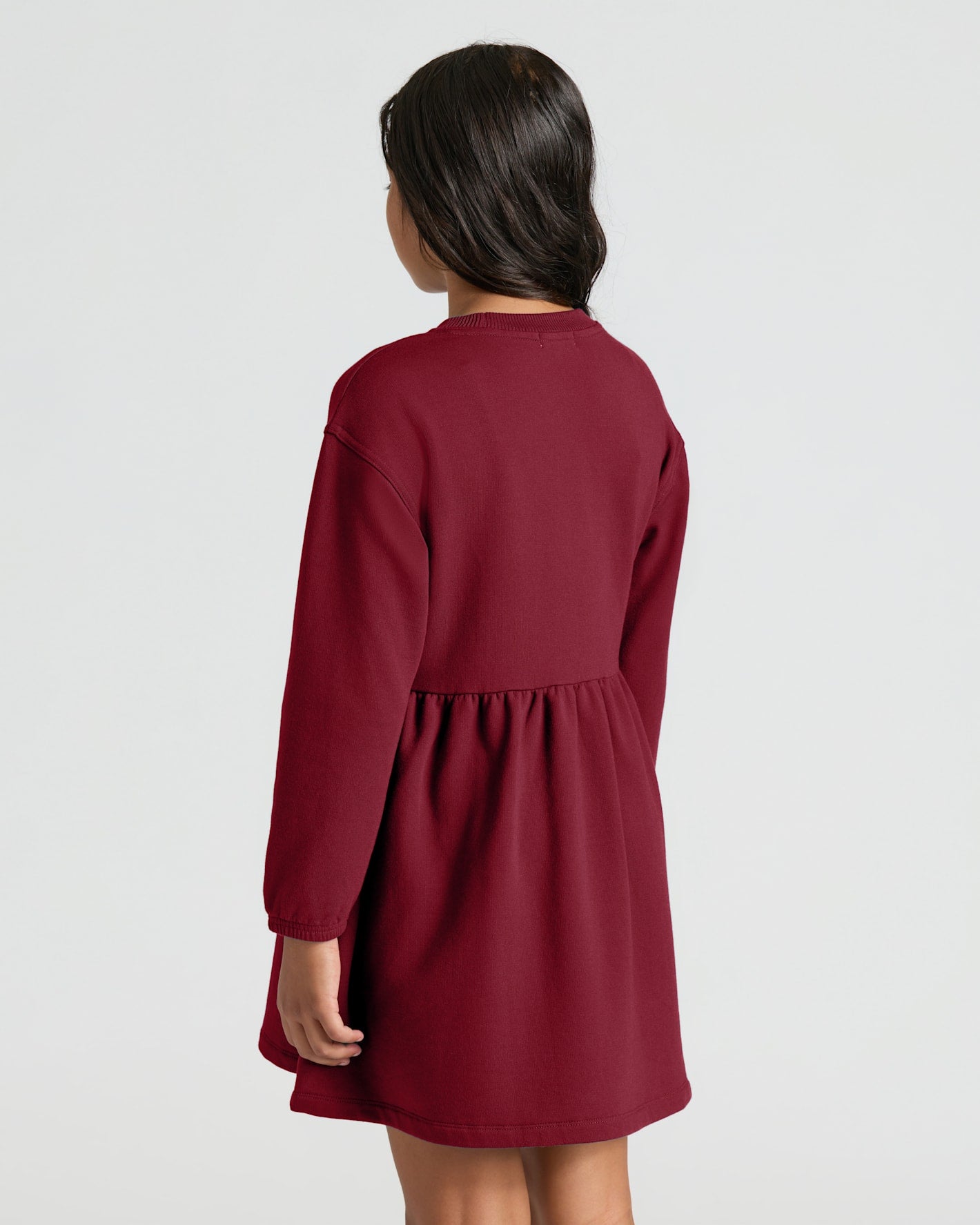 Girls Dark Maroon Long Sleeve Fleece Dress back view, relaxed fit.