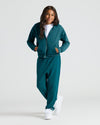 Young person in Girls Black & Deep Emerald Cropped Zip Hoodie.
