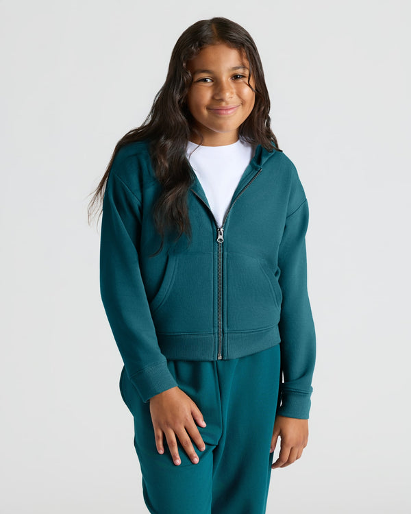 Girl wearing Girls Deep Emerald Cropped Zip Hoodie & Relaxed Joggers.