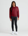 Girl wearing Girls Black & Dark Maroon Slouch Pullover Crew, relaxed fit.