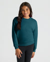 Young person in Girls Deep Emerald Slouch Pullover Crew.
