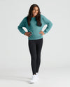 Girl wearing Girls Black & Stormcloud Slouch Pullover Crew, hands on hips.