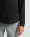 Boys' All Black Classic Long Sleeve Curved Hem Crew Neck, shown tucked in.