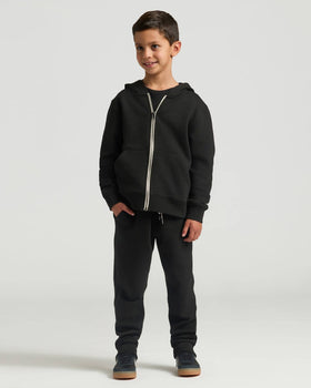 Boy wearing Boys Black Full Zip Fleece Hoodie & Jogger 2-Pack.