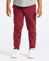 Boys' Dark Maroon Fleece Jogger with white sneakers.