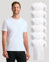 A smiling man wearing a plain white short-sleeve crew-neck T-shirt stands against a light gray background, with six additional stacked views of the same shirt on the right side.