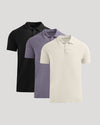 Three polo shirts in black, purple, and white on a light gray background