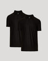 Two black polo shirts on a light gray background