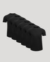 Six black t-shirts stacked on a light gray background