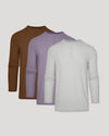 Three long-sleeve henley shirts in brown, lavender purple, and light gray, arranged in a staggered overlapping layout against a solid light gray background.