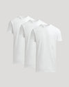 Two white t-shirts stacked on a light gray background