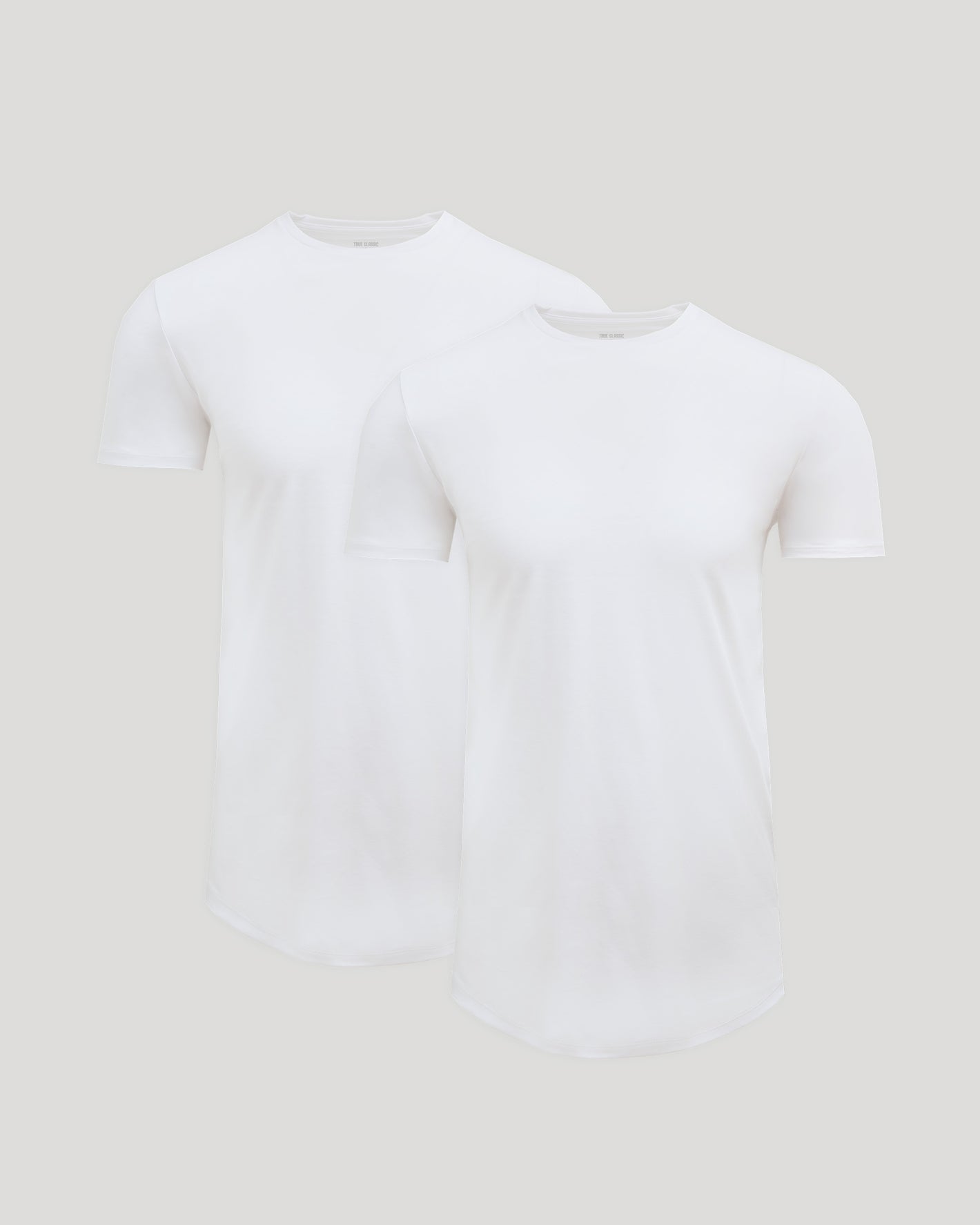 Two white crew neck t-shirts with a curved hem in a soft blend fabric, presented as the Tall Pima Cotton Blend Curved Hem Crew 2-Pack, ideal for men's basics.