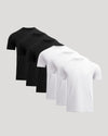Three black and white polo shirts on a light gray background