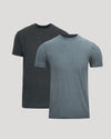 Two short-sleeve crew-neck t-shirts shown on a light gray background, with one in dark charcoal gray and the other in heathered slate blue, layered slightly behind each other.
