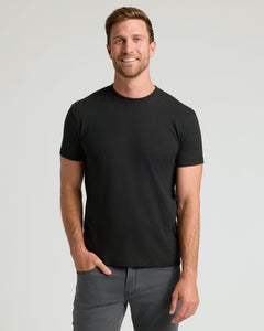 True ClassicMan wearing a black t-shirt against a gray background
