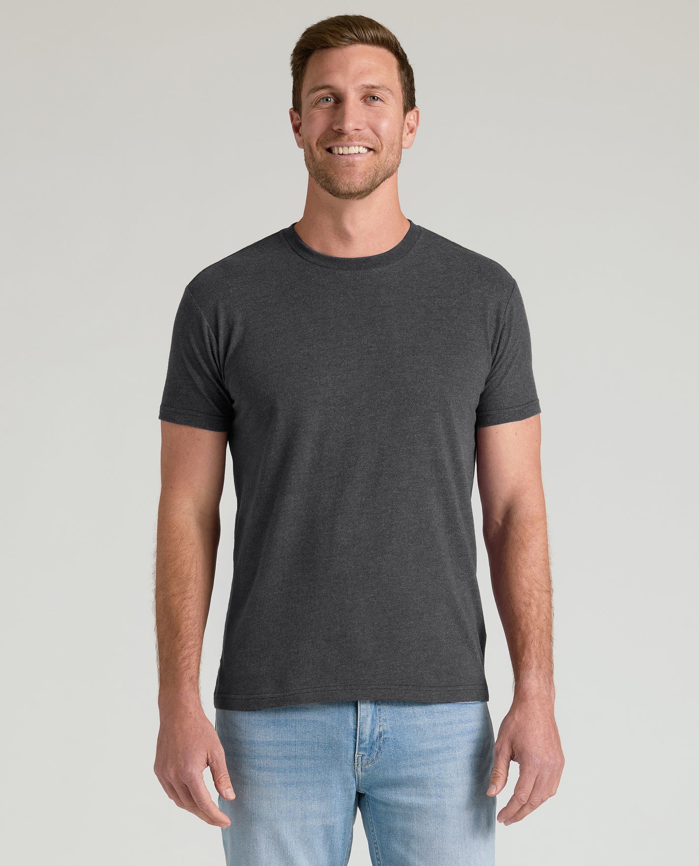 Man wearing Woodland Shades Crew Neck T-shirt, charcoal-gray, relaxed fit.