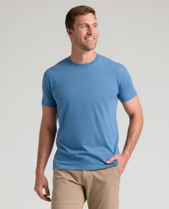 True ClassicMan wearing Classic Crew Neck T-shirt, smiling casually.
