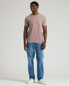 Man wearing Seasonal Classic Crew 3-Pack t-shirt and jeans.