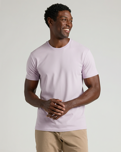 True ClassicMan wearing a light purple t-shirt against a plain background