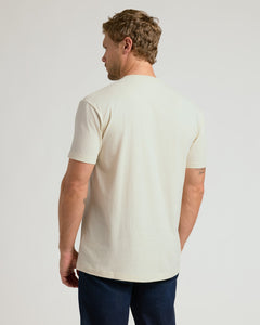 True ClassicMan wearing a plain white t-shirt on a light gray background