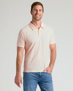 True ClassicMan in Coral Blush Classic Polo, smiling casually.