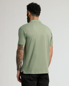 True ClassicBack view of man in Dark Heather Bay Green Classic Polo.