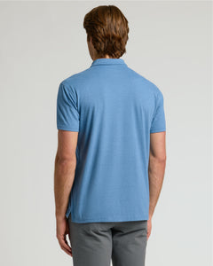 True ClassicBack view of man in Dark Heather Blue Lake Classic Polo.