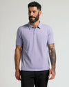 Heather Dark Orchid Short Sleeve Polo worn by a bearded man.