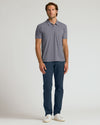Heather Graphite Short Sleeve Polo on man with relaxed posture.