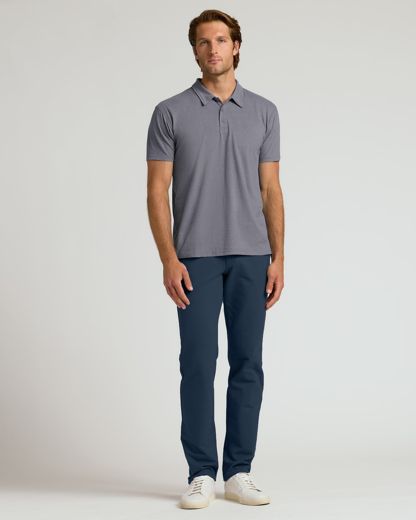 Heather Graphite Short Sleeve Polo on man with relaxed posture.