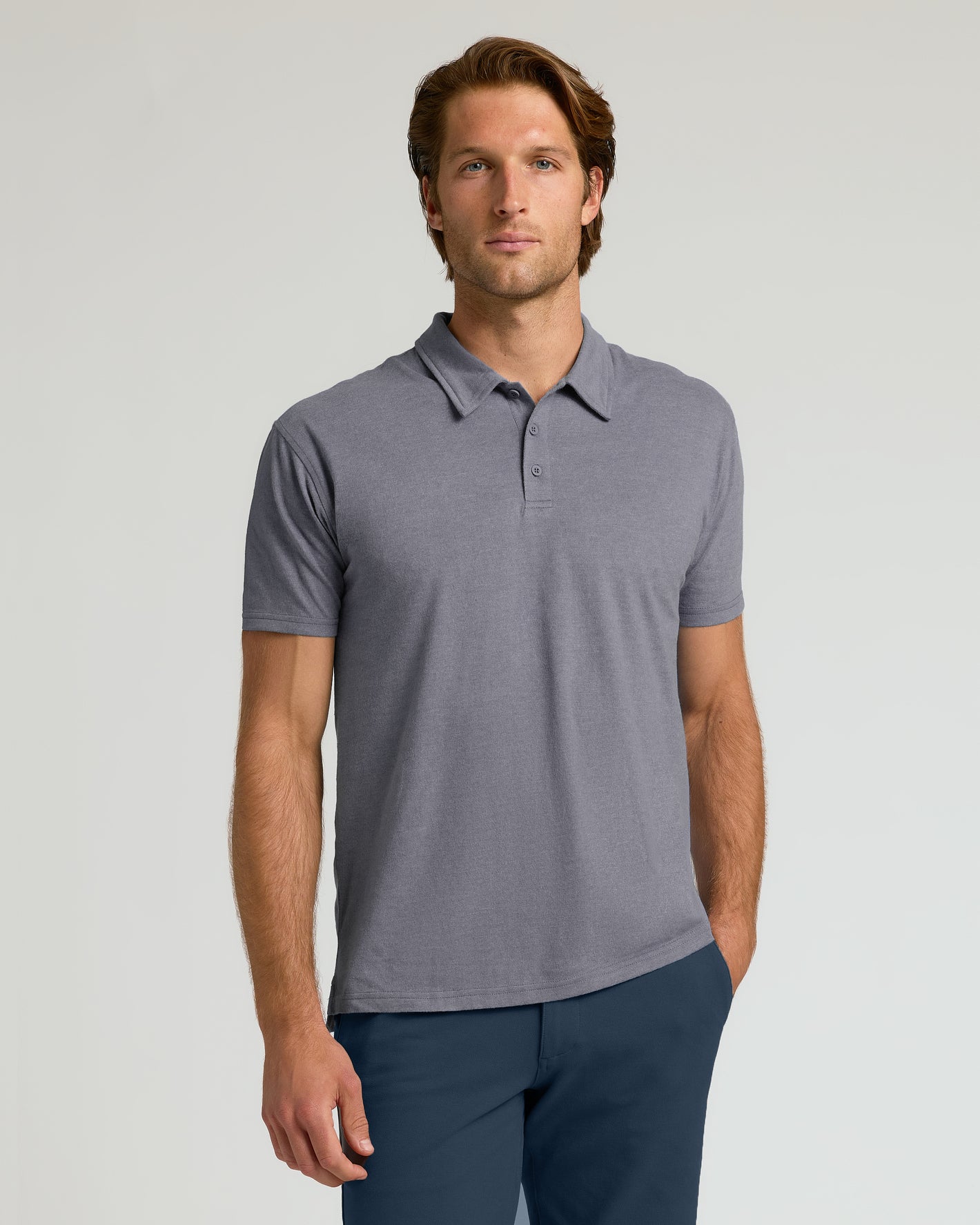 Heather Graphite Short Sleeve Polo worn by a man, facing forward.