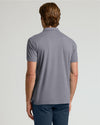 Heather Graphite Short Sleeve Polo worn by man from behind.