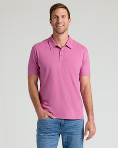 True ClassicMan wearing Heather Magenta Classic Polo with blue jeans.
