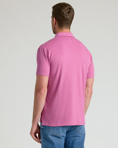 True ClassicBack view of Heather Magenta Classic Polo worn with blue jeans.