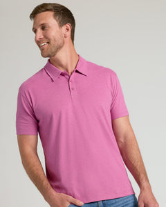 True ClassicMan wearing Heather Magenta Classic Polo with blue jeans.