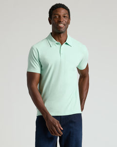 True ClassicMan wearing Heather Mist Short Sleeve Polo with dark blue jeans.