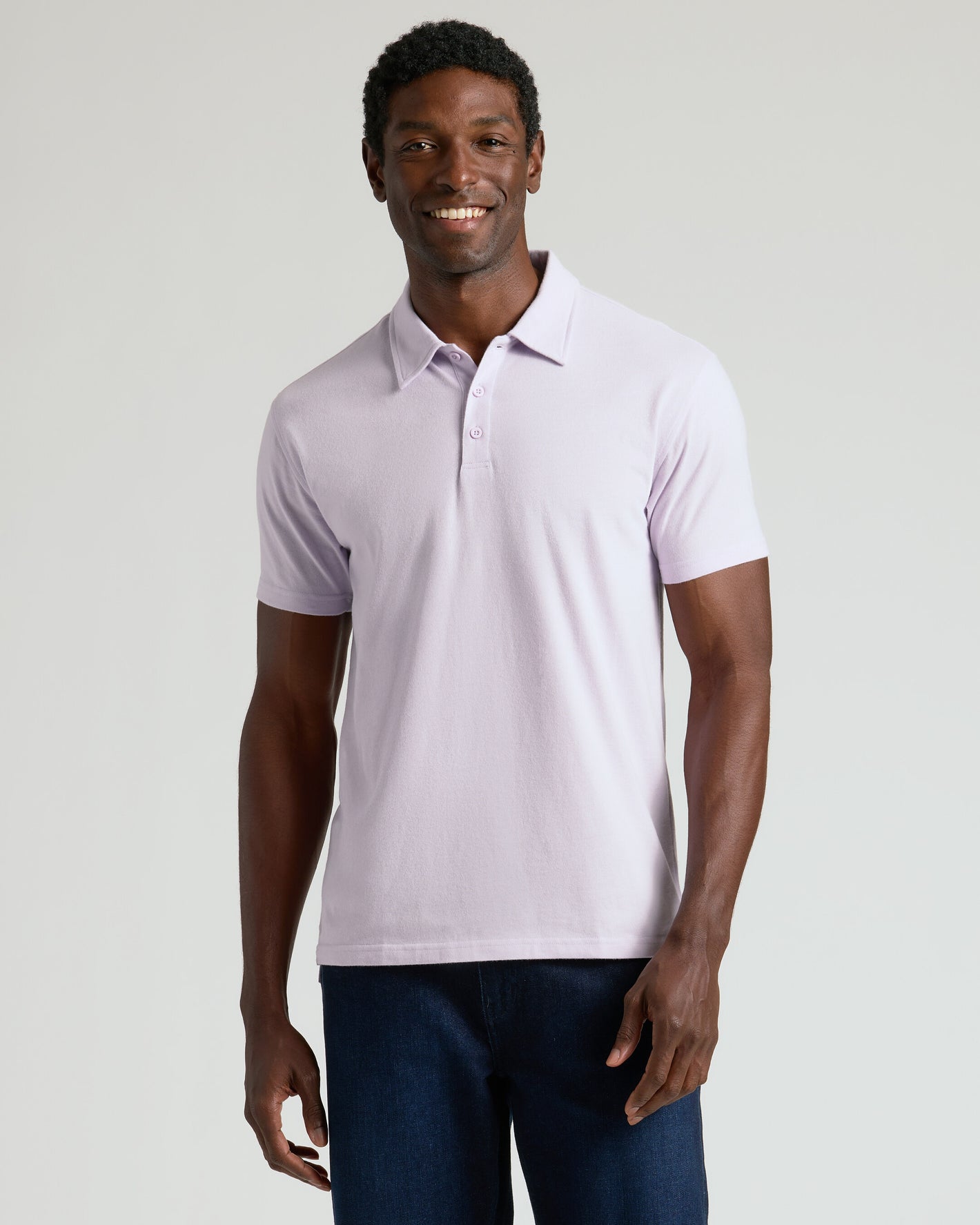 Man wearing Limited Short Sleeve Classic Polo 3-Pack in lavender.