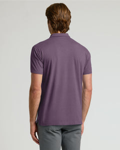 True ClassicMan wearing a purple polo shirt on a light gray background