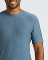 Close-up of a man wearing a Baltic Active Crew Neck Tee in a soft blue color, showcasing the comfortable fit and casual style of this men's basics essential.