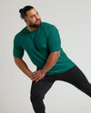 Man stretching in Clover Active Crew Neck Tee.