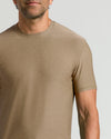Man wearing a brown short-sleeve Driftwood Active Crew Neck Tee, showcasing a comfortable fit and classic crew neck design in a men's basics style.