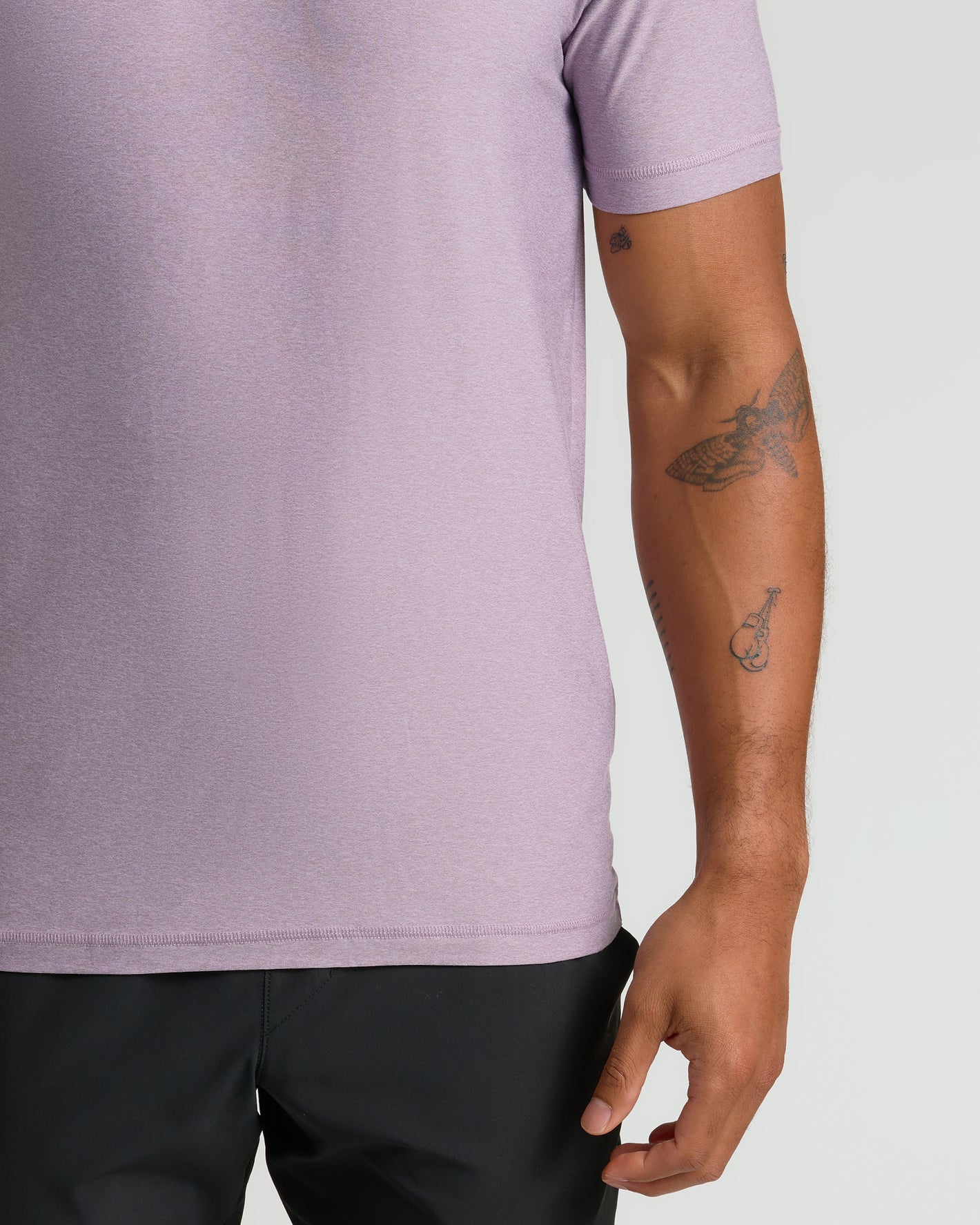 Iris Active Crew Neck Tee with tattoos on arm visible.