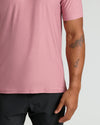 Quartz Rose Active Crew Neck Tee, showcasing tattoos on the forearm.