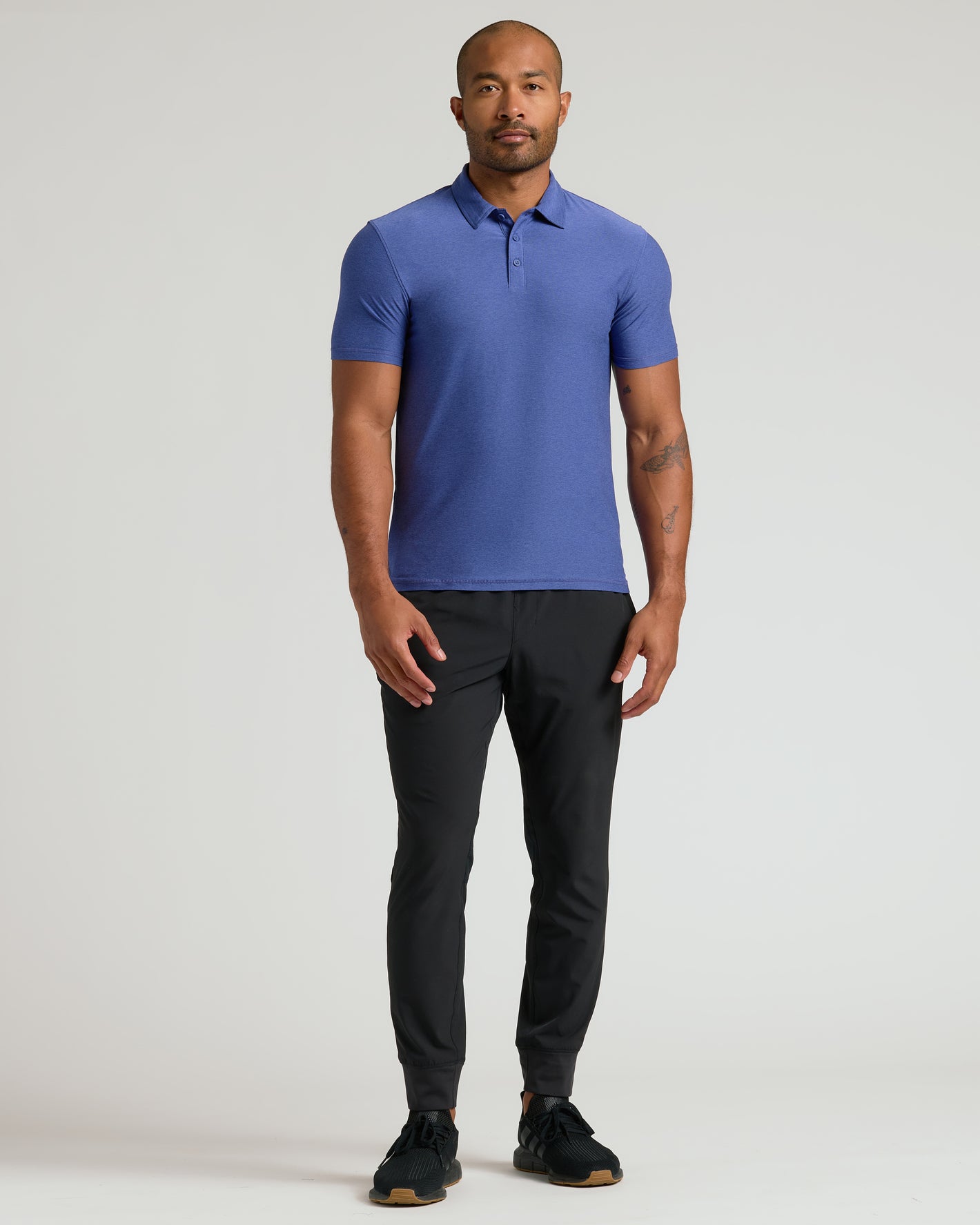 Cosmos Active Polo 2.0 in studio portrait, showcasing fit and style.