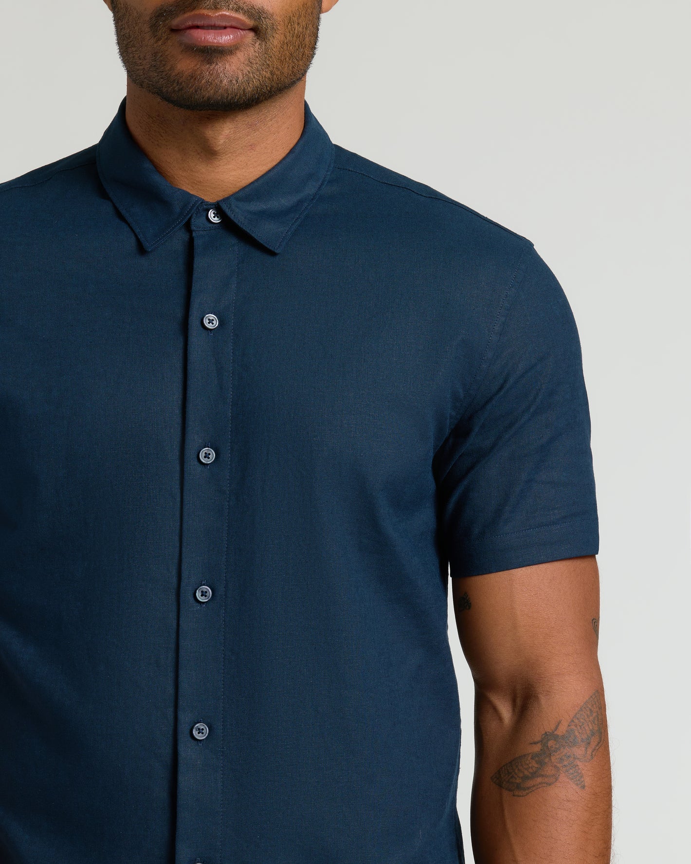 Navy Short Sleeve Linen Shirt with point collar and button-down front.