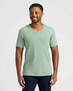 True ClassicMan wearing a green V-neck t-shirt against a plain background