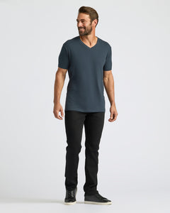 True ClassicMan wearing Seasonal Classic V-Neck 3-Pack T-shirt, black pants, sneakers.